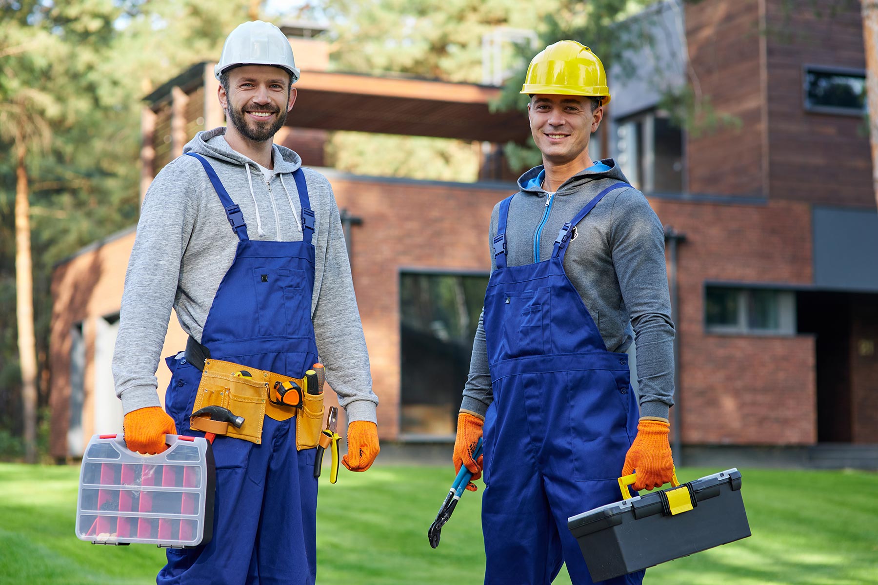 two-positive-handsome-young-male-engineers-in-hard-resize.jpg